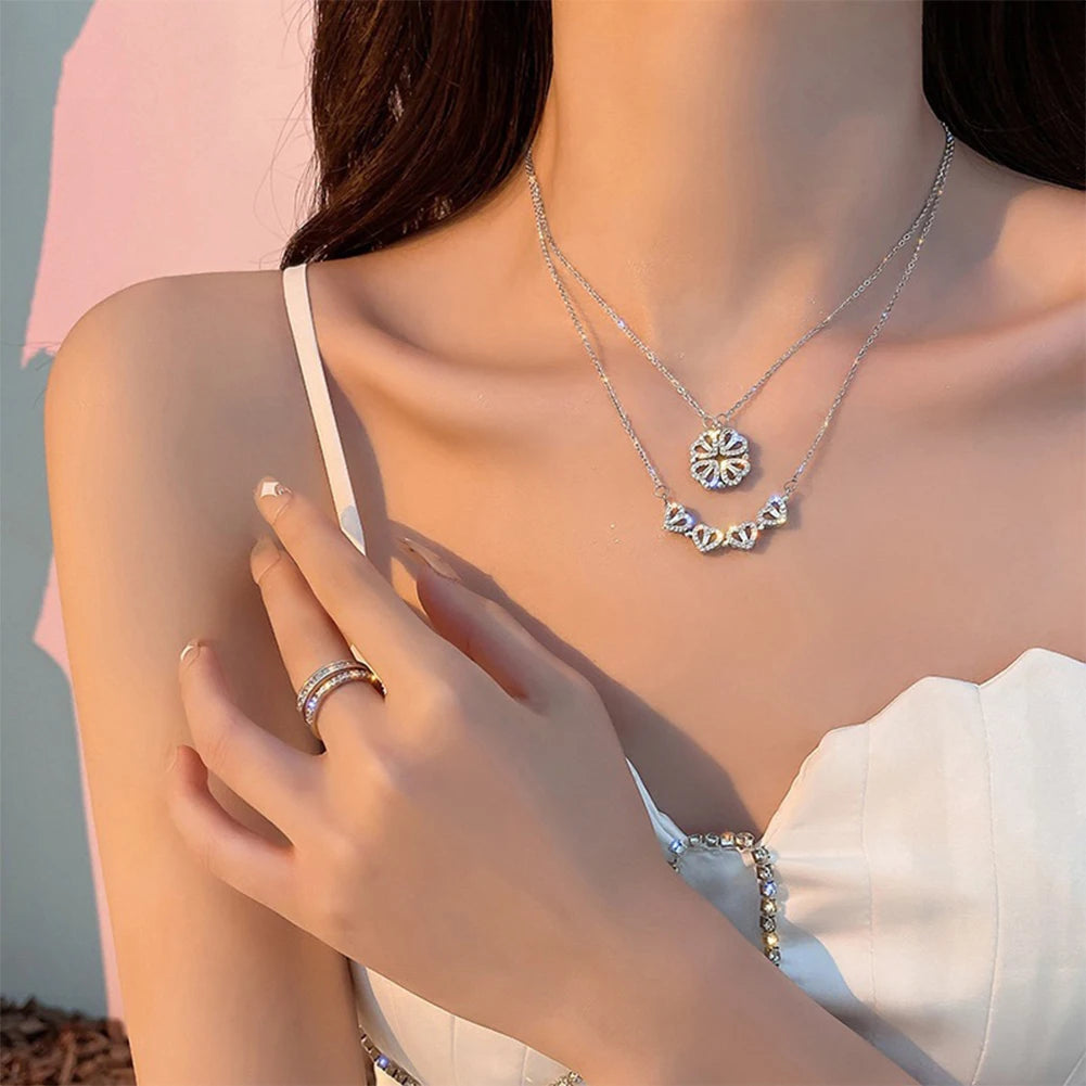 Elegant layered four-leaf clover necklace in silver, perfect for enhancing any outfit