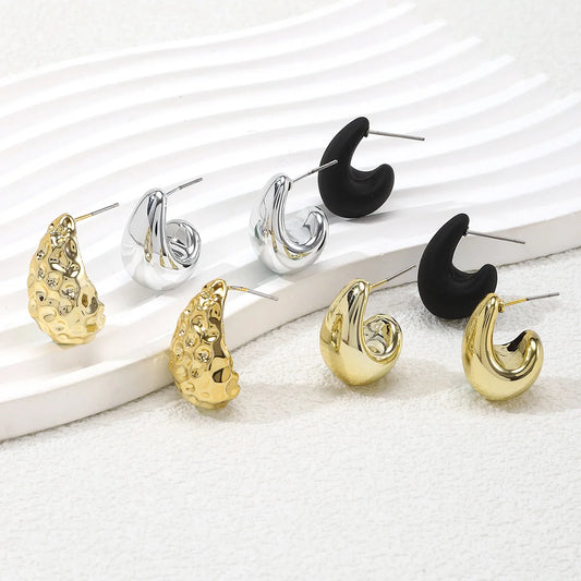 Elegant tear drop party earrings in gold, silver, and black for stylish occasions