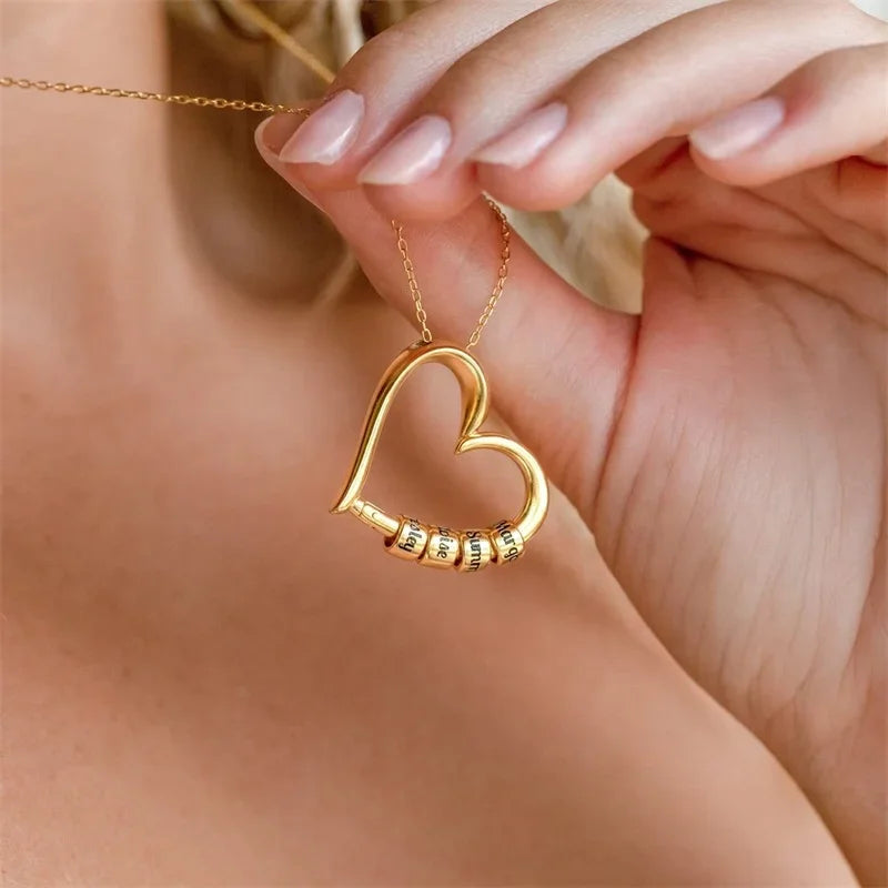 Elegant personalized heart necklace for women featuring customizable charms in gold
